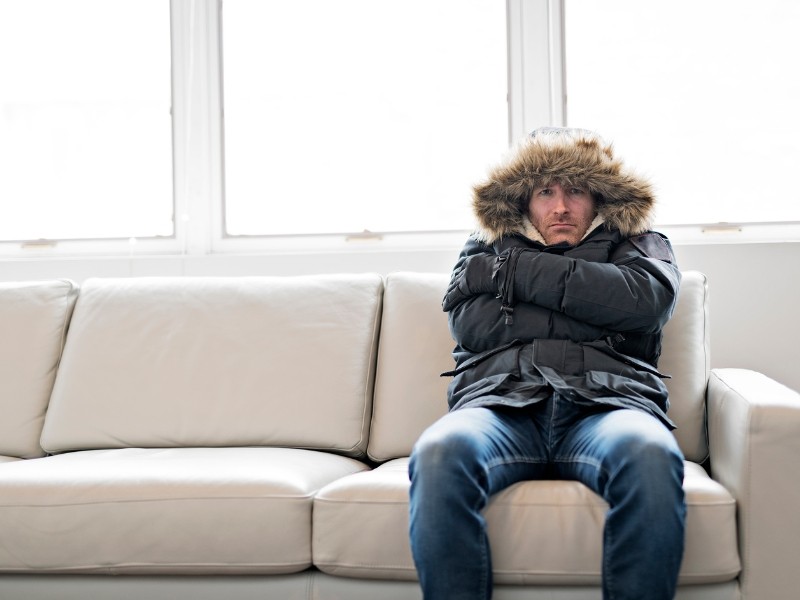 how to keep your home warm and not sit on the couch freezing in a winter jacket
